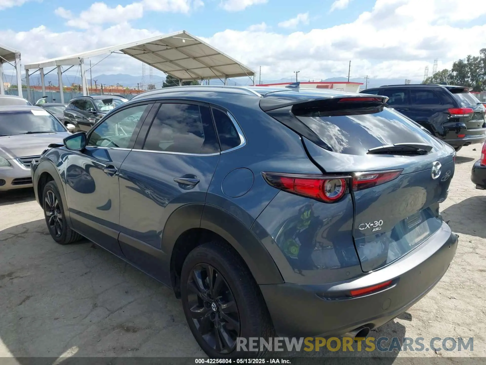 3 Фотография поврежденного автомобиля 3MVDMBEY2NM447805 MAZDA CX-30 2022