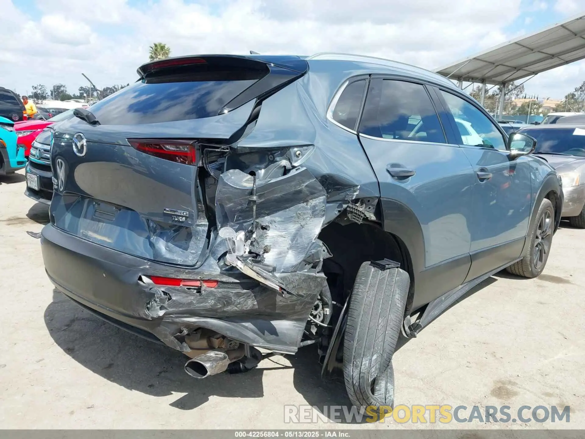 4 Фотография поврежденного автомобиля 3MVDMBEY2NM447805 MAZDA CX-30 2022