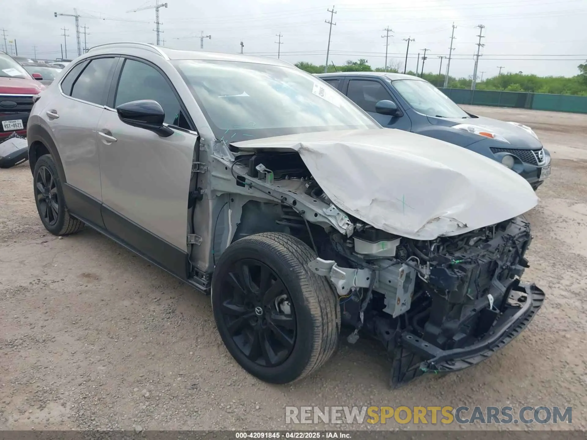 1 Фотография поврежденного автомобиля 3MVDMBEY3NM437459 MAZDA CX-30 2022