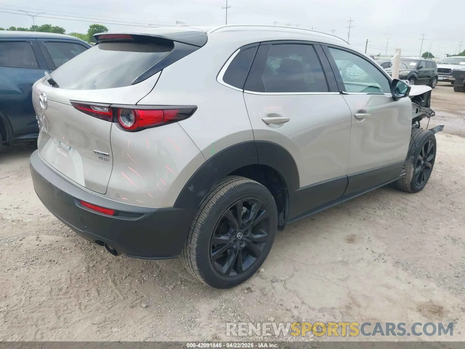 4 Фотография поврежденного автомобиля 3MVDMBEY3NM437459 MAZDA CX-30 2022