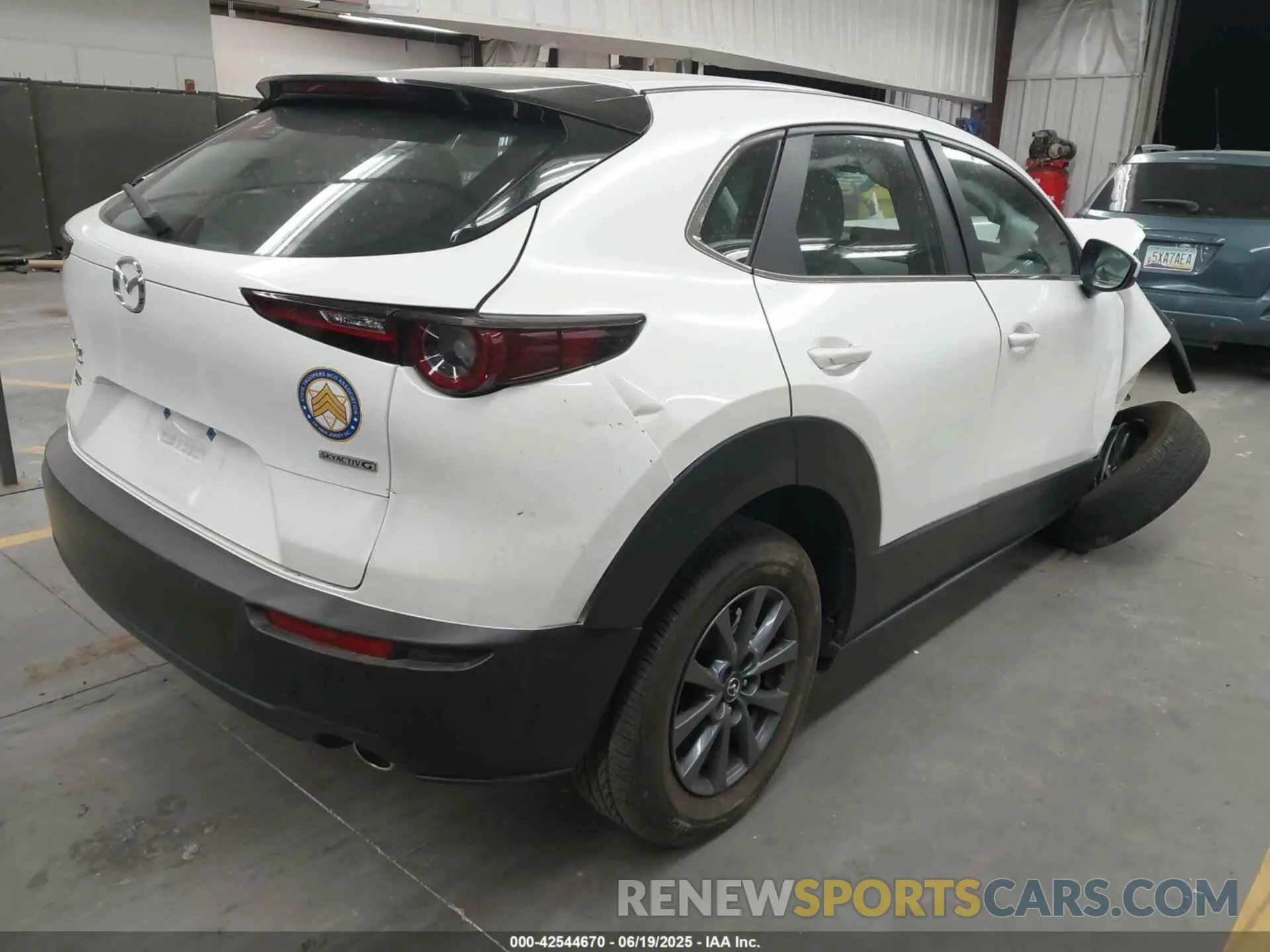 4 Фотография поврежденного автомобиля 3MVDMBAM5PM510403 MAZDA CX-30 2023