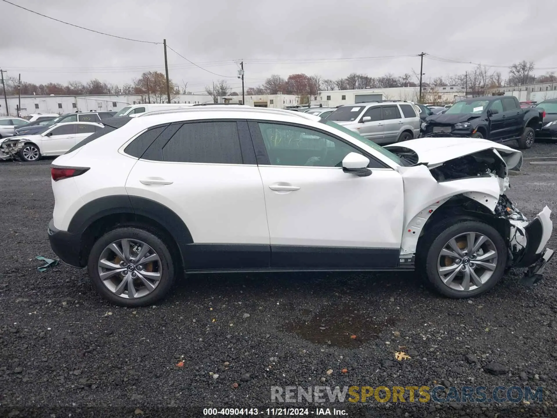 13 Фотография поврежденного автомобиля 3MVDMBCM0PM579464 MAZDA CX-30 2023