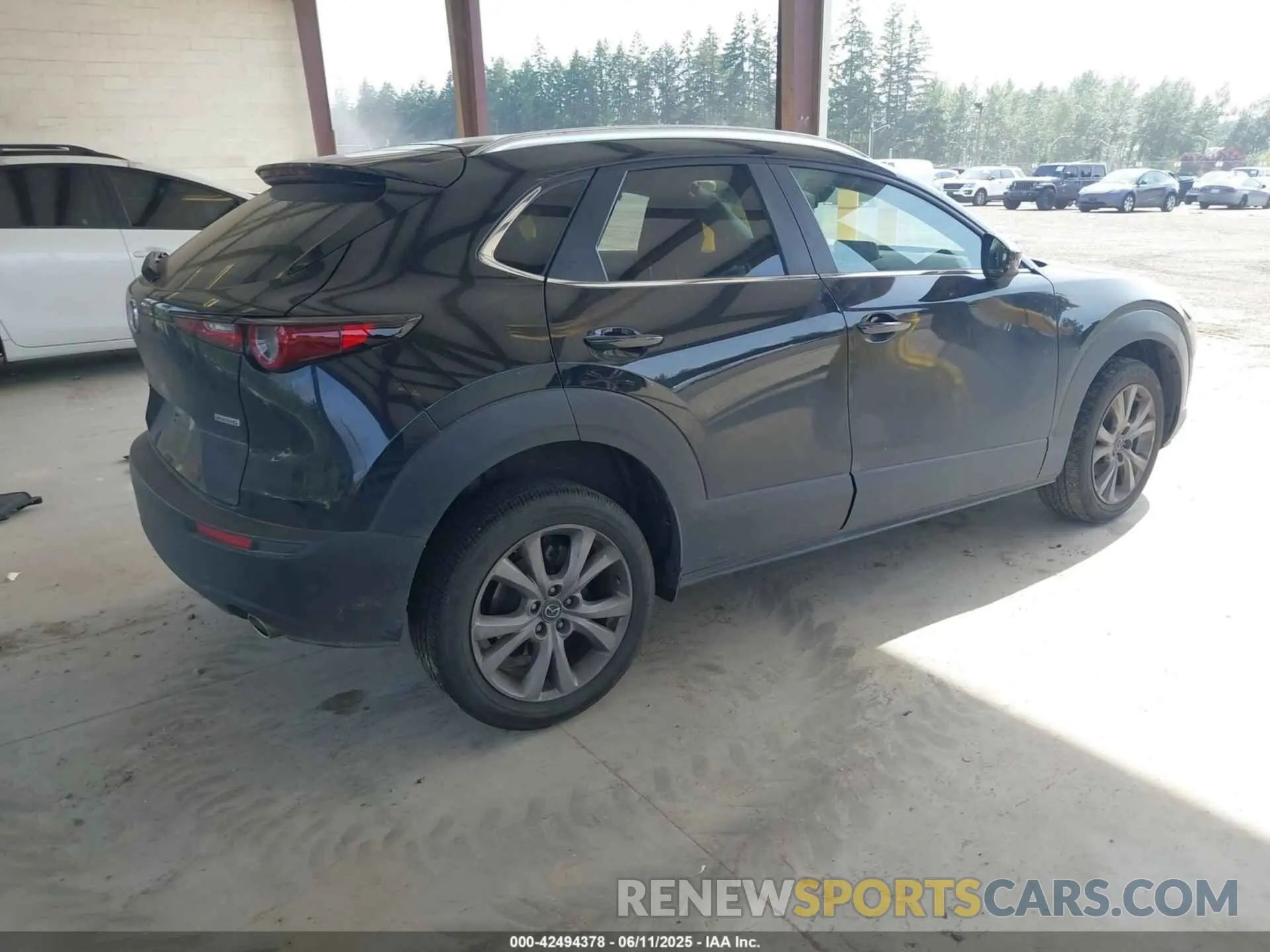 4 Photograph of a damaged car 3MVDMBCM8PM569152 MAZDA CX-30 2023