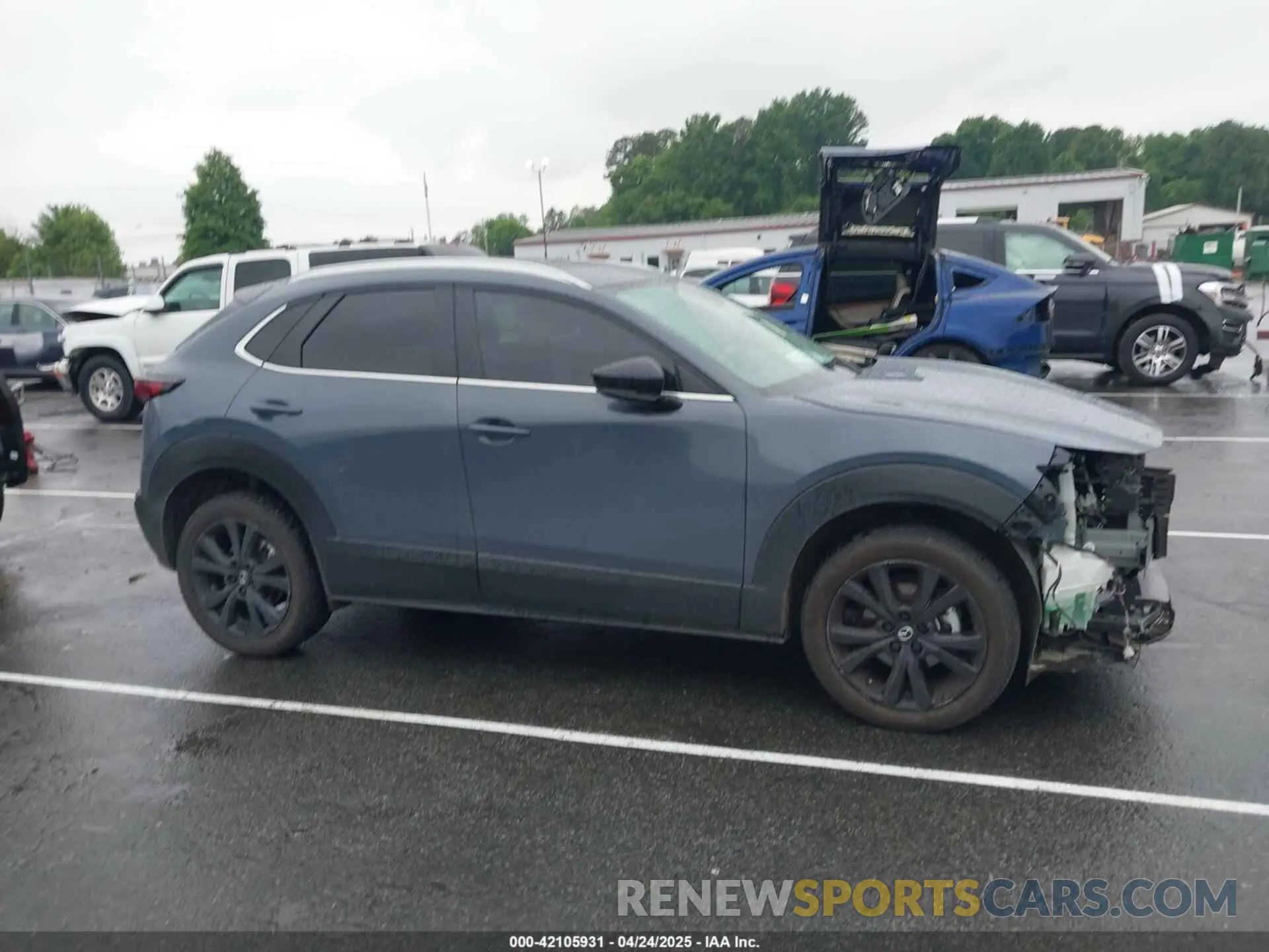 14 Photograph of a damaged car 3MVDMBCM9PM574358 MAZDA CX-30 2023