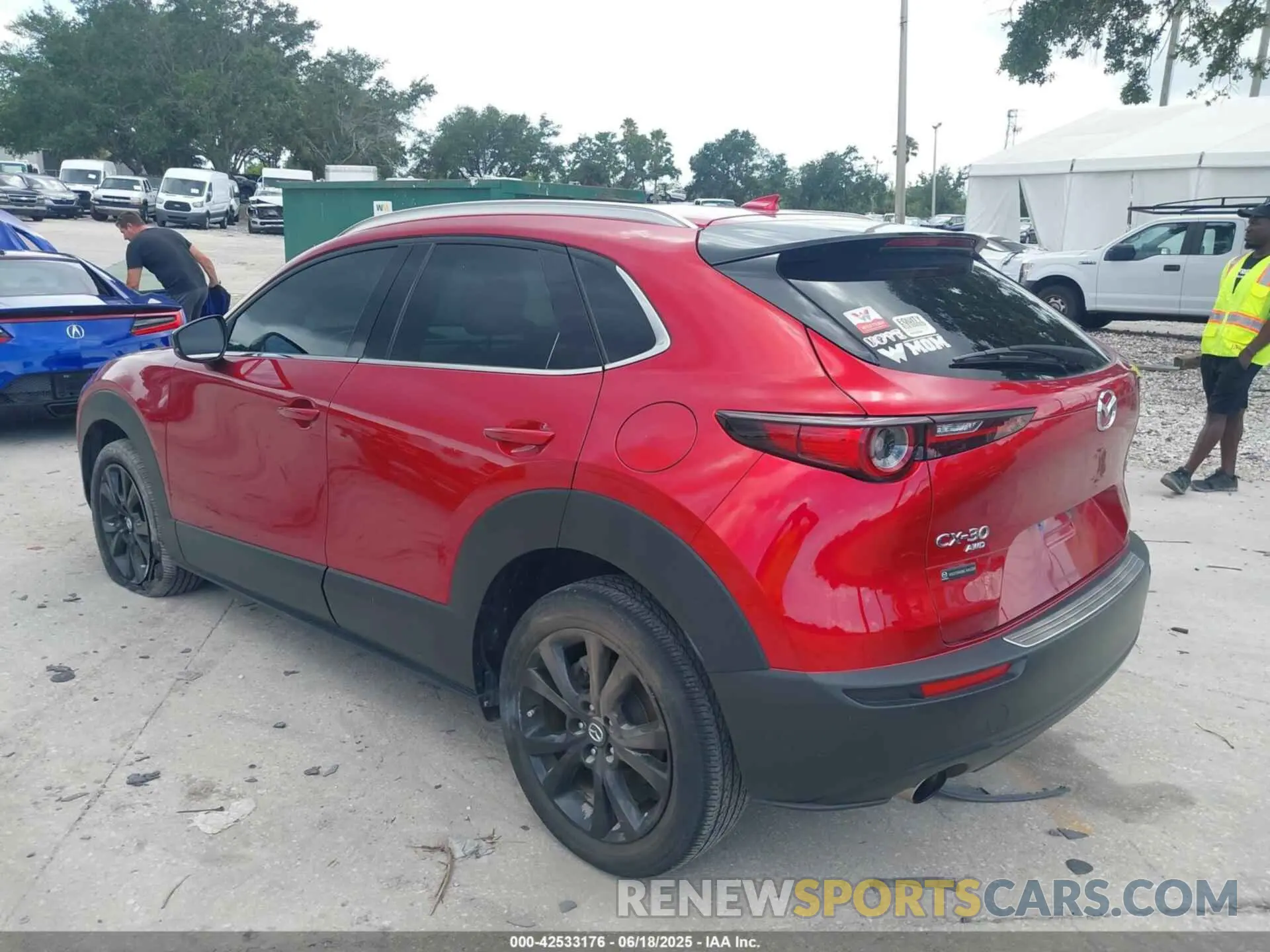 3 Фотография поврежденного автомобиля 3MVDMBDY3PM507398 MAZDA CX-30 2023