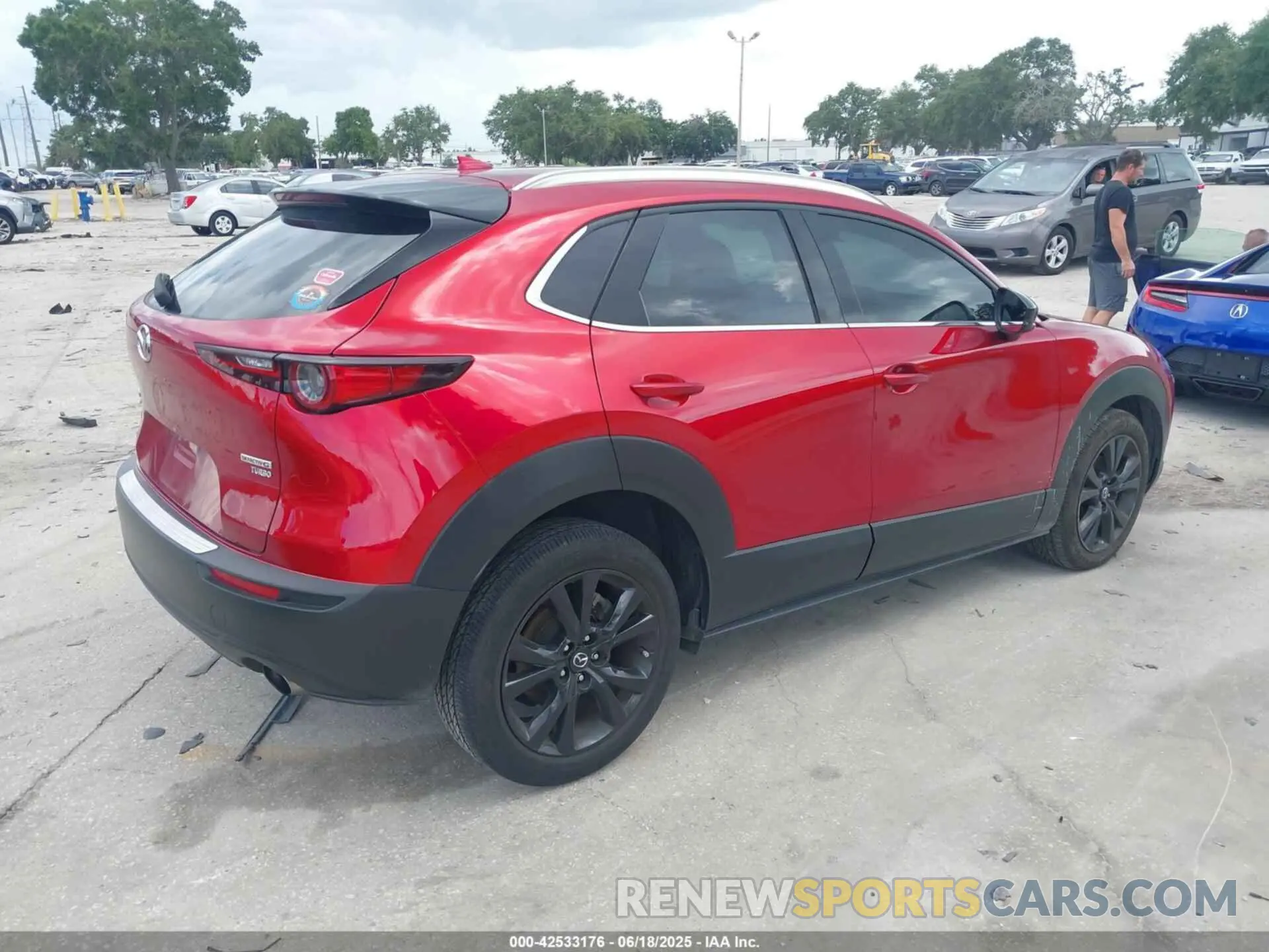 4 Фотография поврежденного автомобиля 3MVDMBDY3PM507398 MAZDA CX-30 2023
