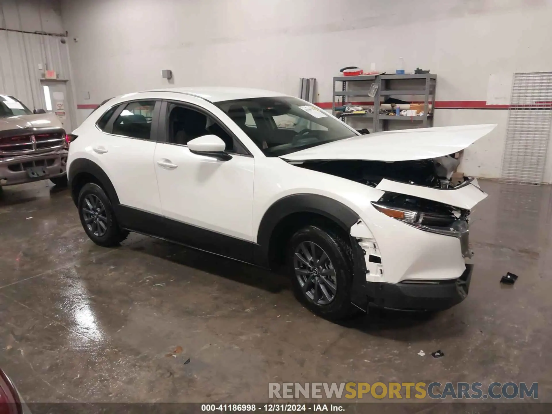 1 Photograph of a damaged car 3MVDMBAM1RM720211 MAZDA CX-30 2024