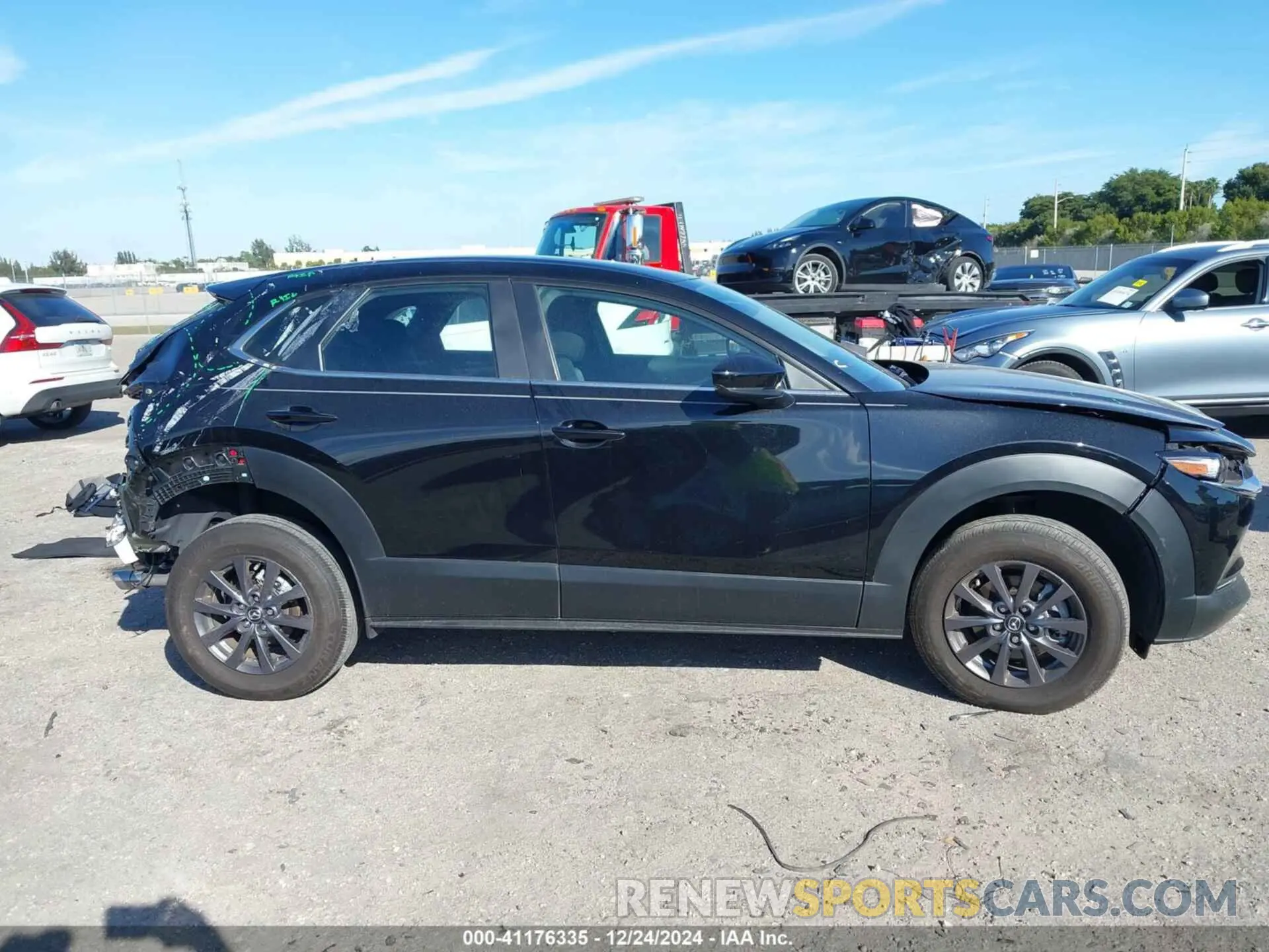 14 Photograph of a damaged car 3MVDMBAM4RM644757 MAZDA CX-30 2024