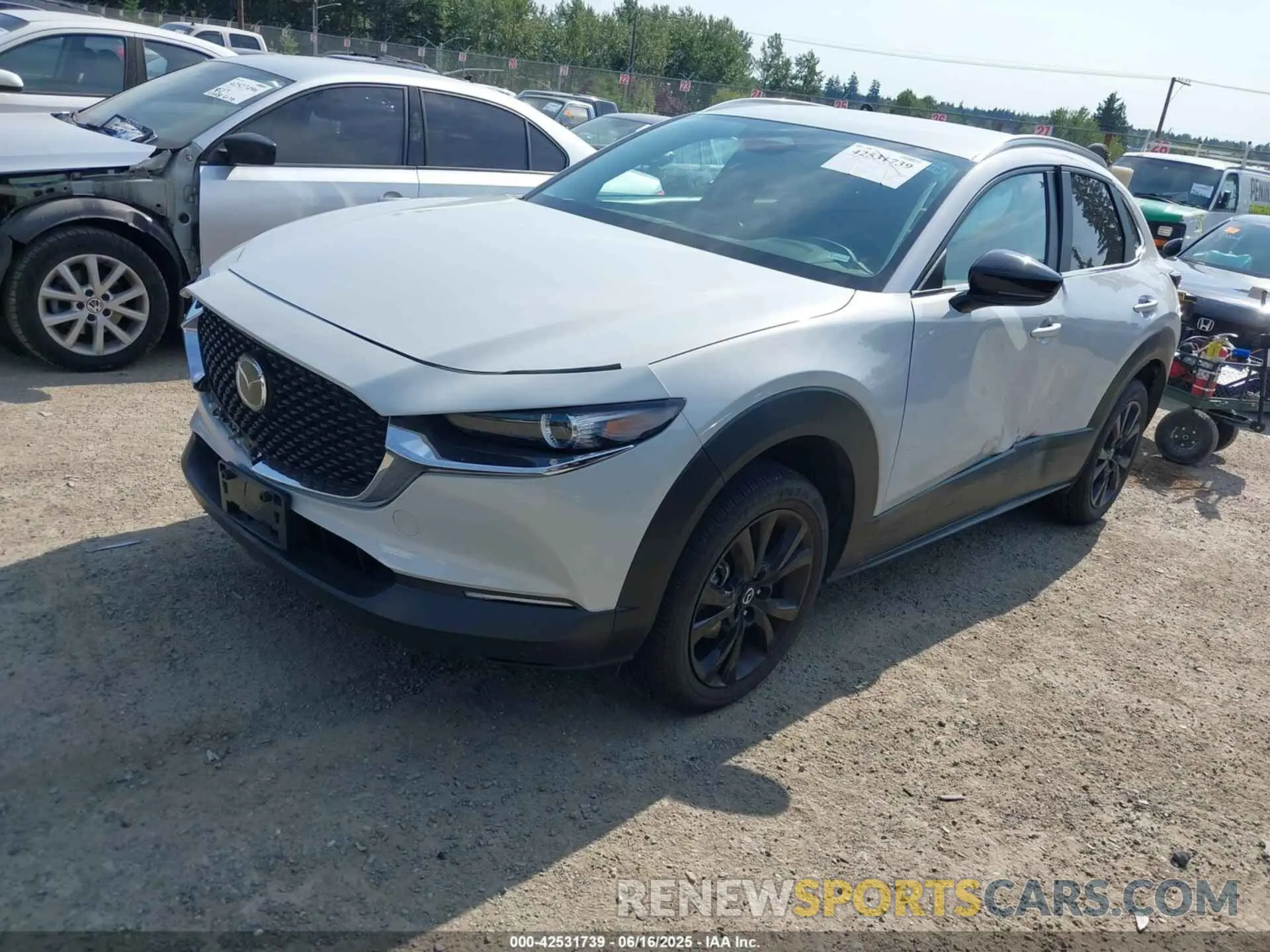 2 Photograph of a damaged car 3MVDMBBM4RM693570 MAZDA CX-30 2024