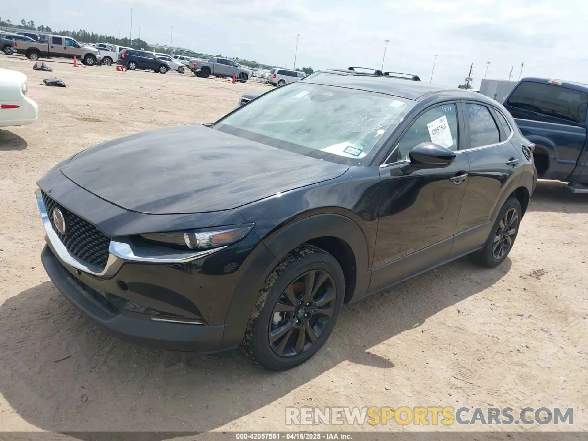 2 Photograph of a damaged car 3MVDMBBMXRM625841 MAZDA CX-30 2024