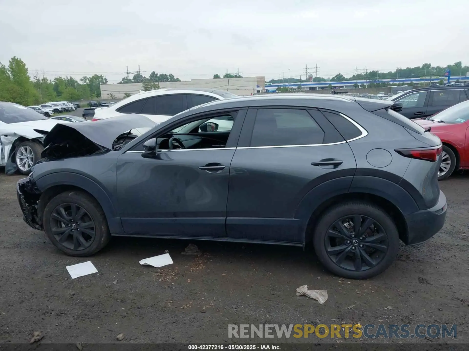 14 Photograph of a damaged car 3MVDMBBMXRM676708 MAZDA CX-30 2024