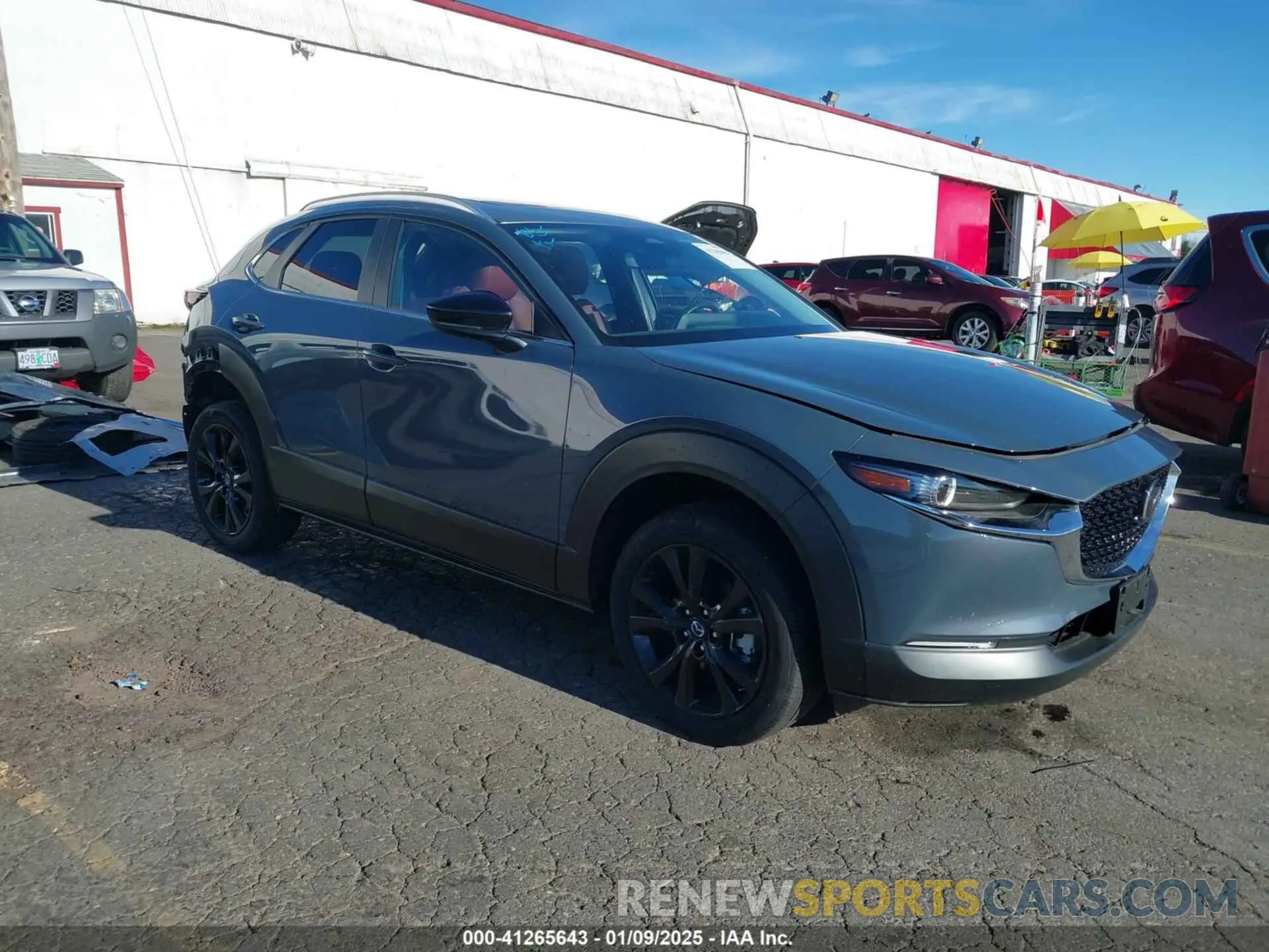 1 Photograph of a damaged car 3MVDMBCM2RM621362 MAZDA CX-30 2024