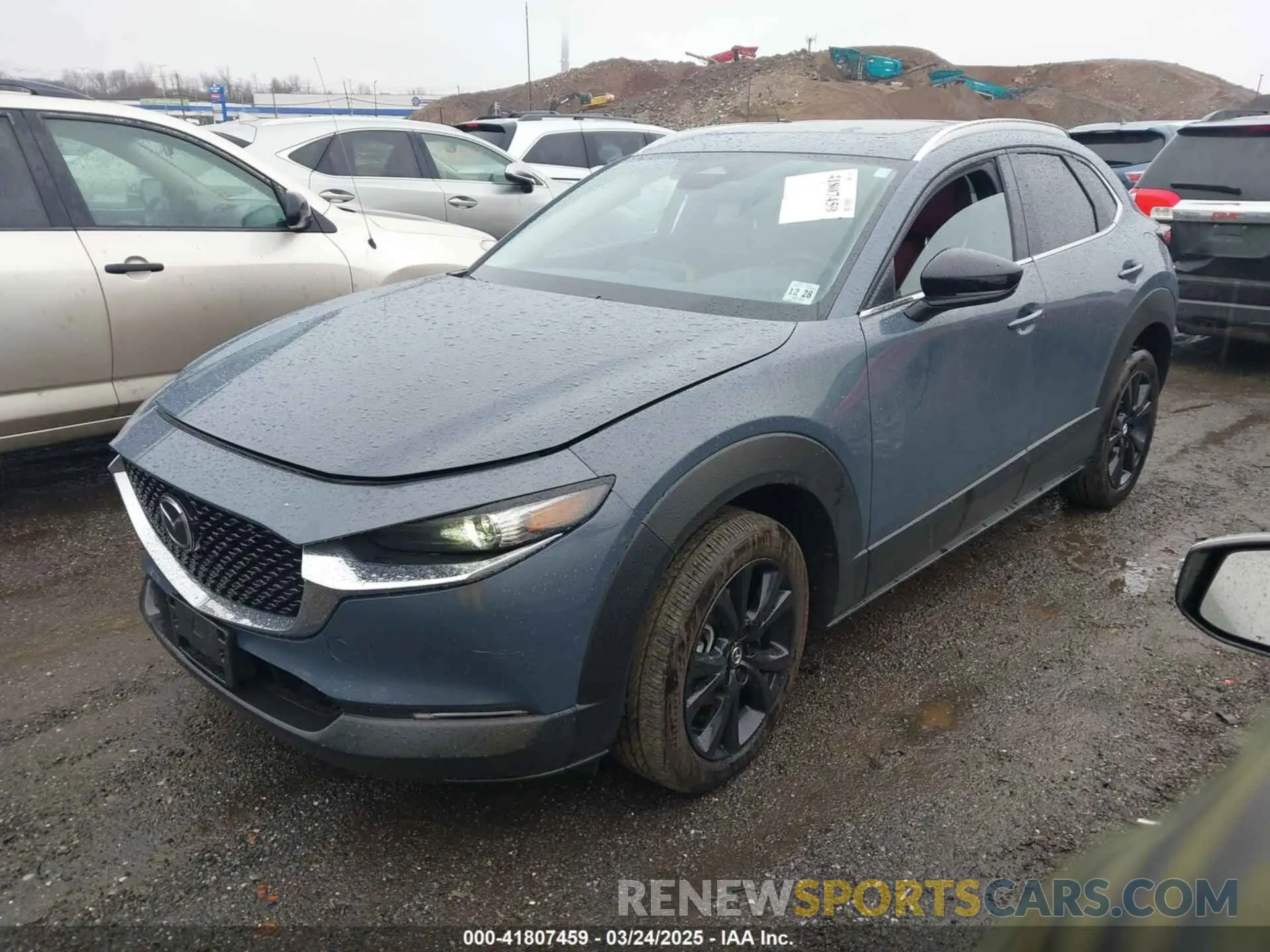 2 Photograph of a damaged car 3MVDMBCM7RM606050 MAZDA CX-30 2024