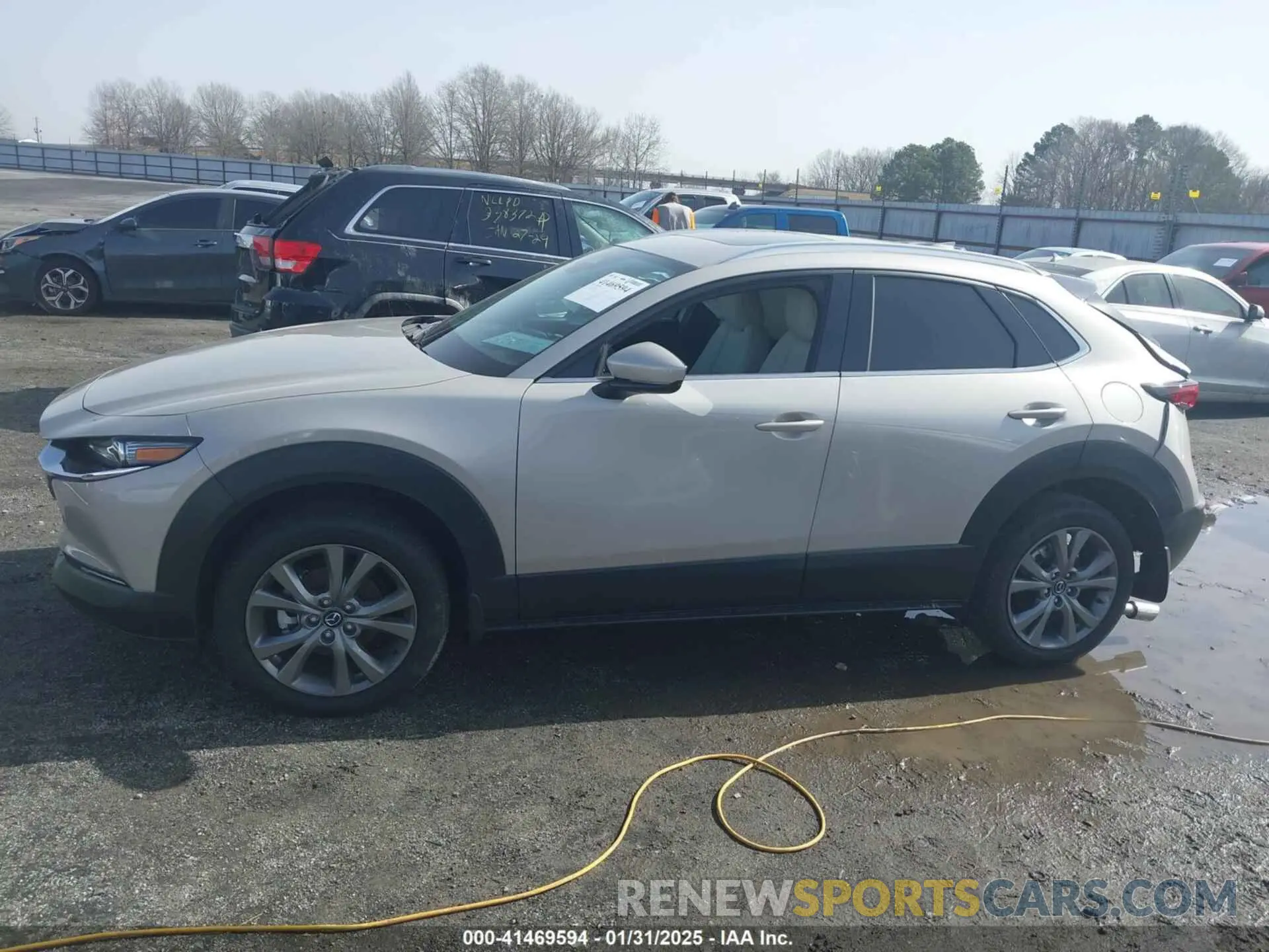 14 Photograph of a damaged car 3MVDMBDM3RM675235 MAZDA CX-30 2024