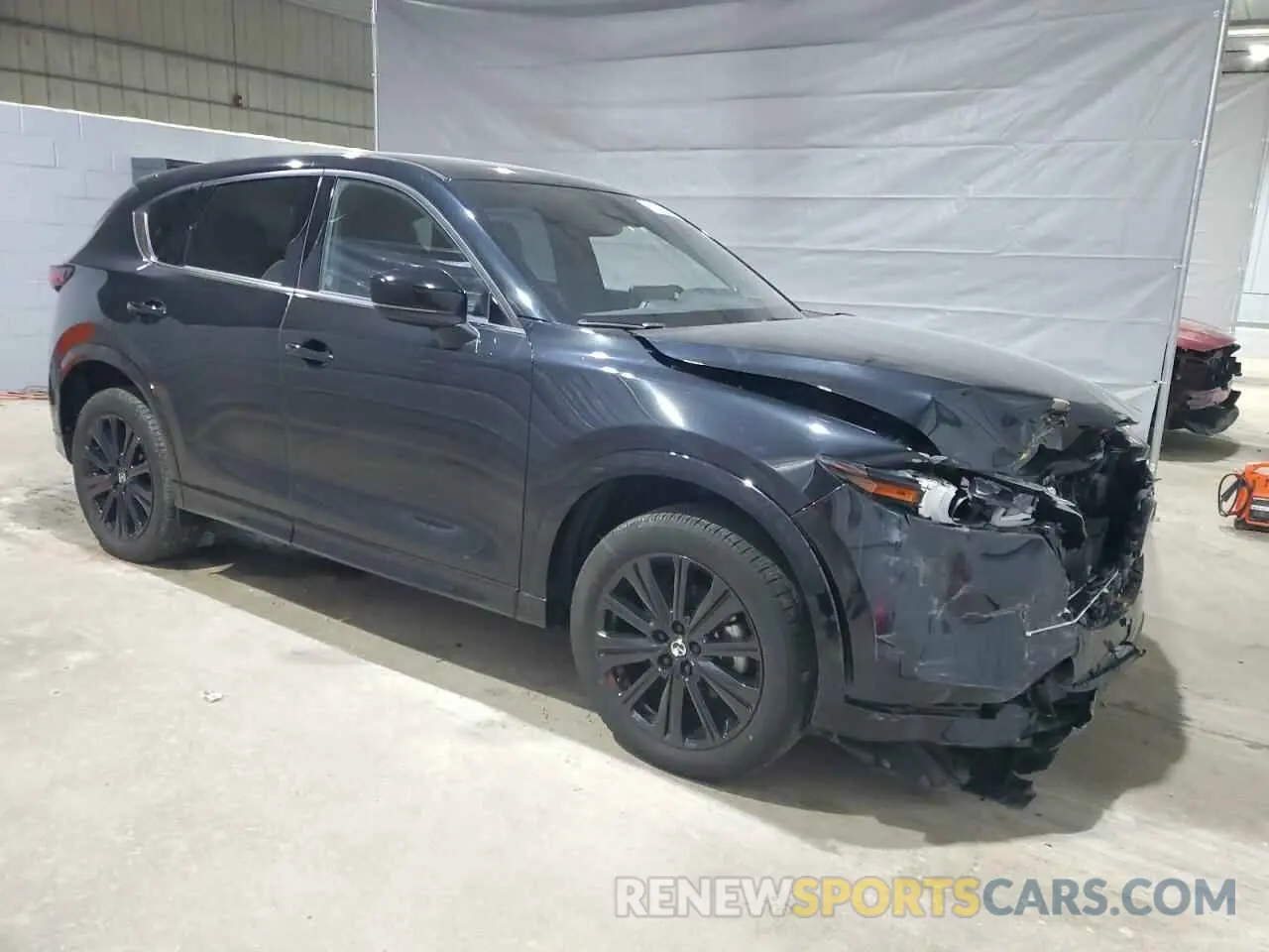 4 Photograph of a damaged car JM3KFBAYXP0120266 MAZDA CX-5 2023