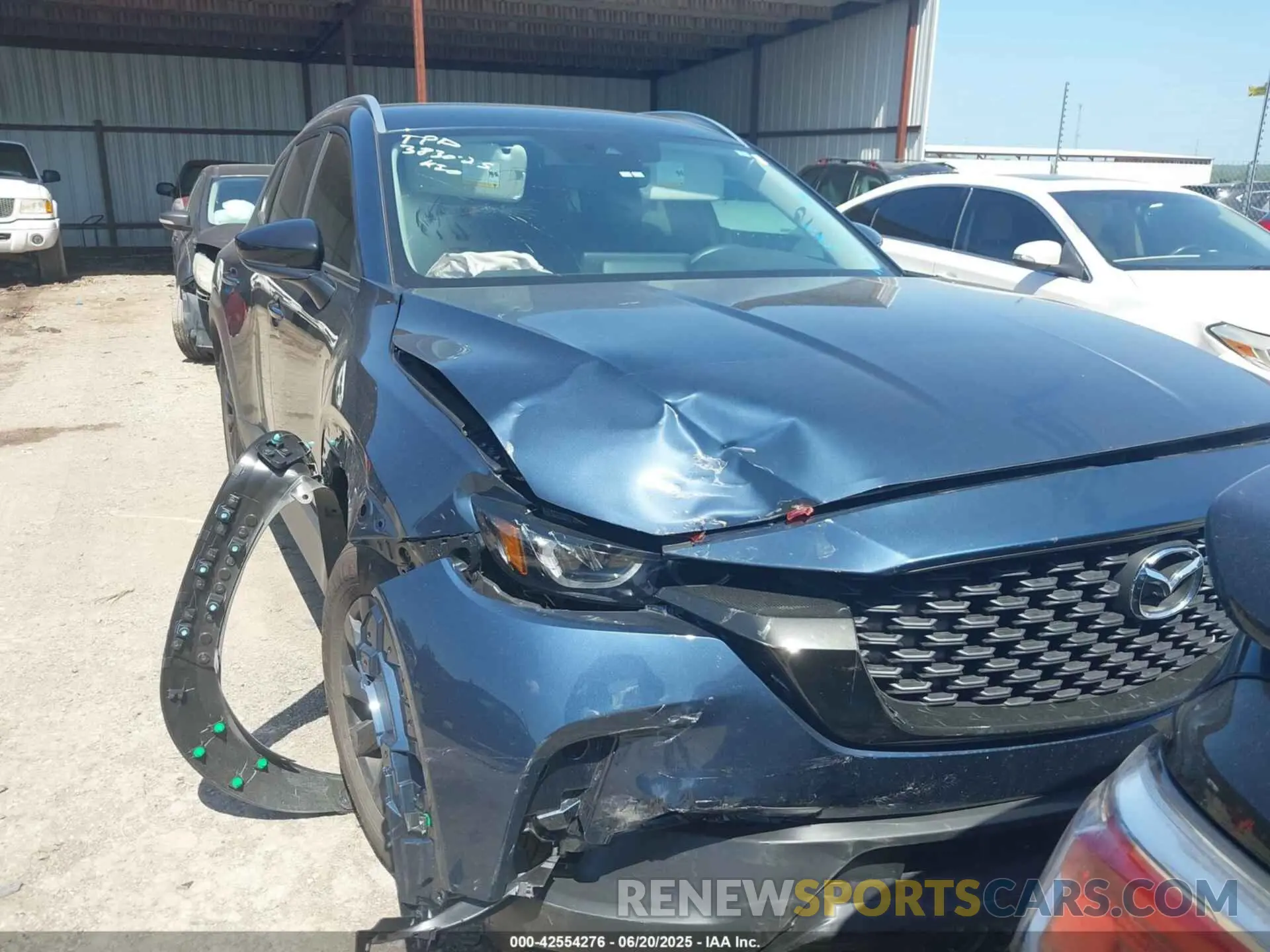 1 Photograph of a damaged car 7MMVABBM4RN205478 MAZDA CX-50 2024