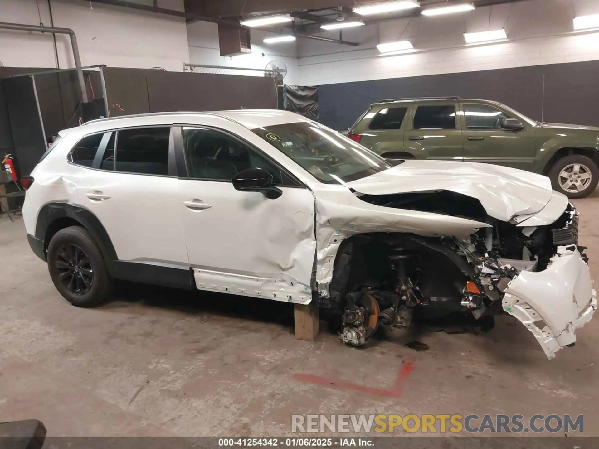 12 Photograph of a damaged car 7MMVABBMXRN213519 MAZDA CX-50 2024