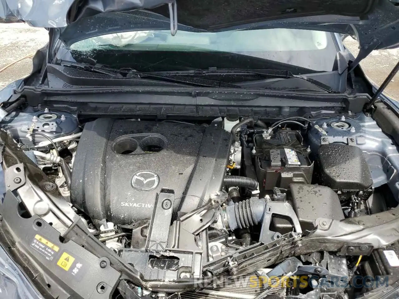 12 Photograph of a damaged car 7MMVABCM7PN103829 MAZDA CX-50 PREF 2023