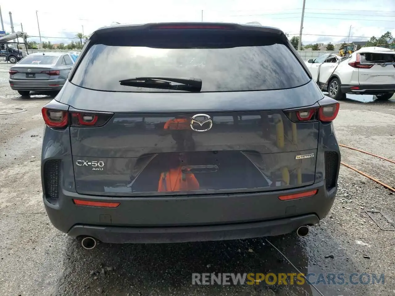 6 Photograph of a damaged car 7MMVABCM7PN103829 MAZDA CX-50 PREF 2023