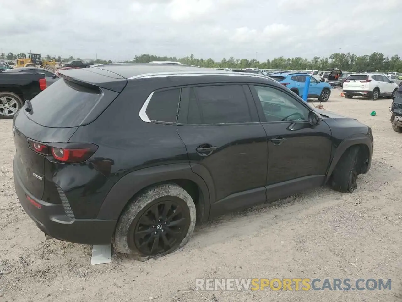3 Photograph of a damaged car 7MMVABCM7PN147605 MAZDA CX-50 PREF 2023