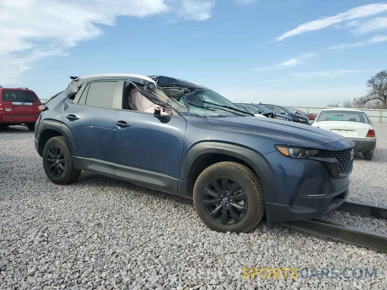 4 Photograph of a damaged car 7MMVABBMXRN185639 MAZDA CX-50 PREF 2024