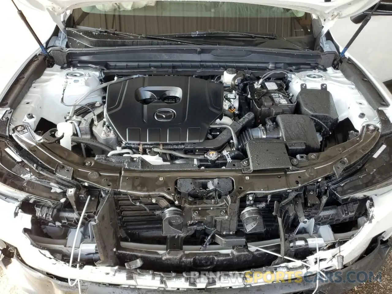 12 Photograph of a damaged car 7MMVABBM1SN345963 MAZDA CX-50 PREF 2025