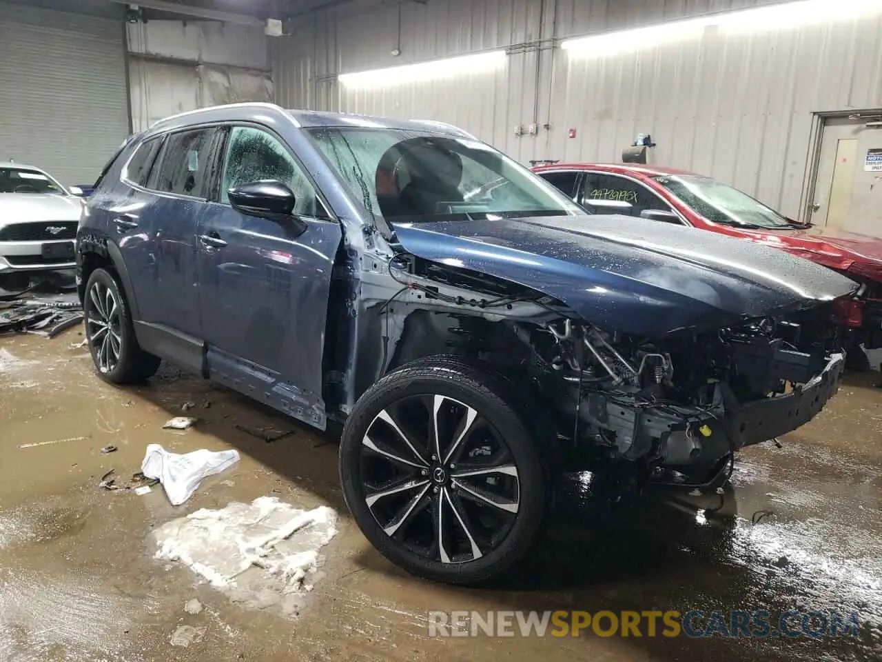 4 Photograph of a damaged car 7MMVABDY0RN174004 MAZDA CX-50 PREM 2024