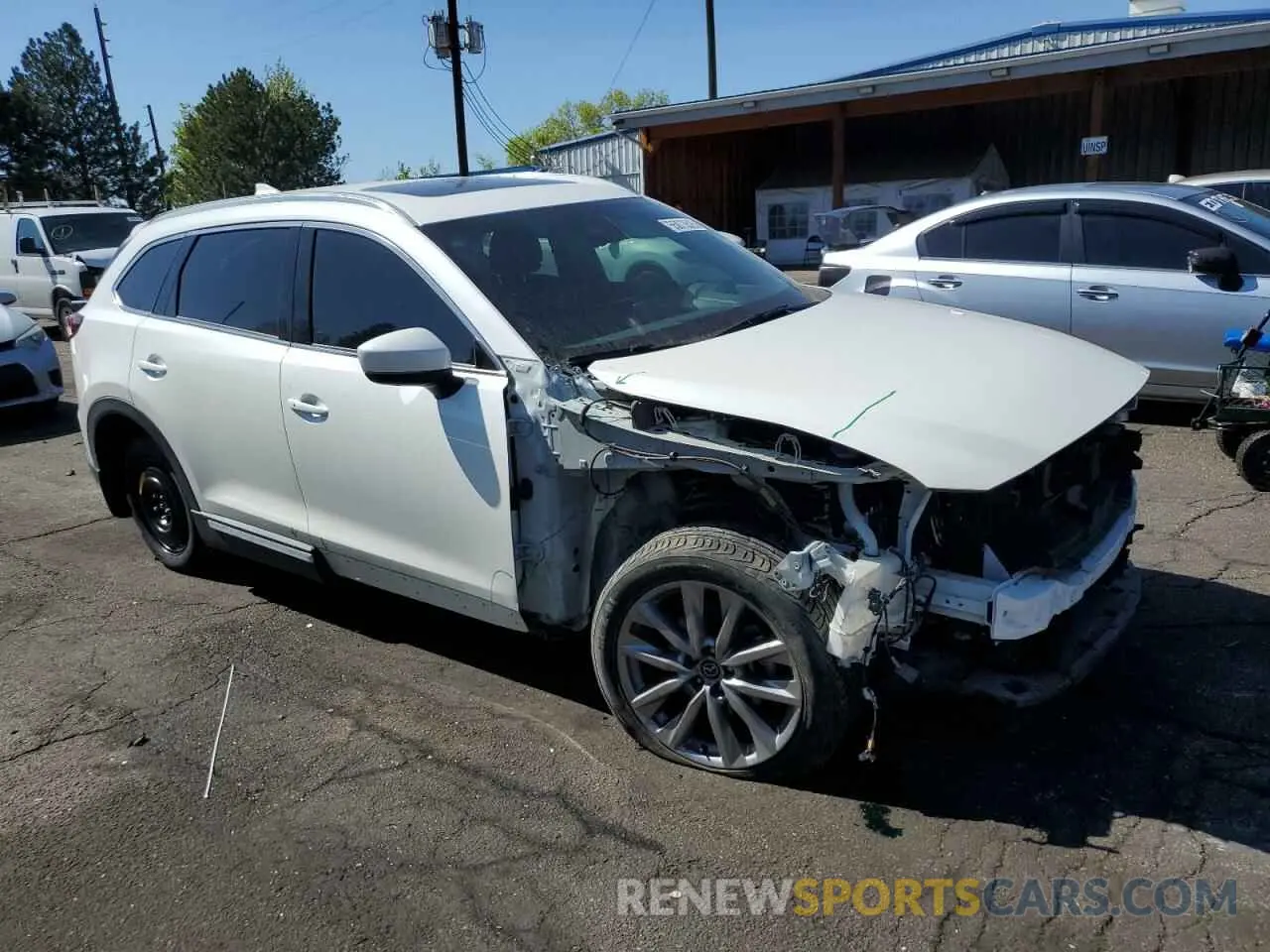 4 Photograph of a damaged car JM3TCBDY8L0414302 MAZDA CX-9 2020