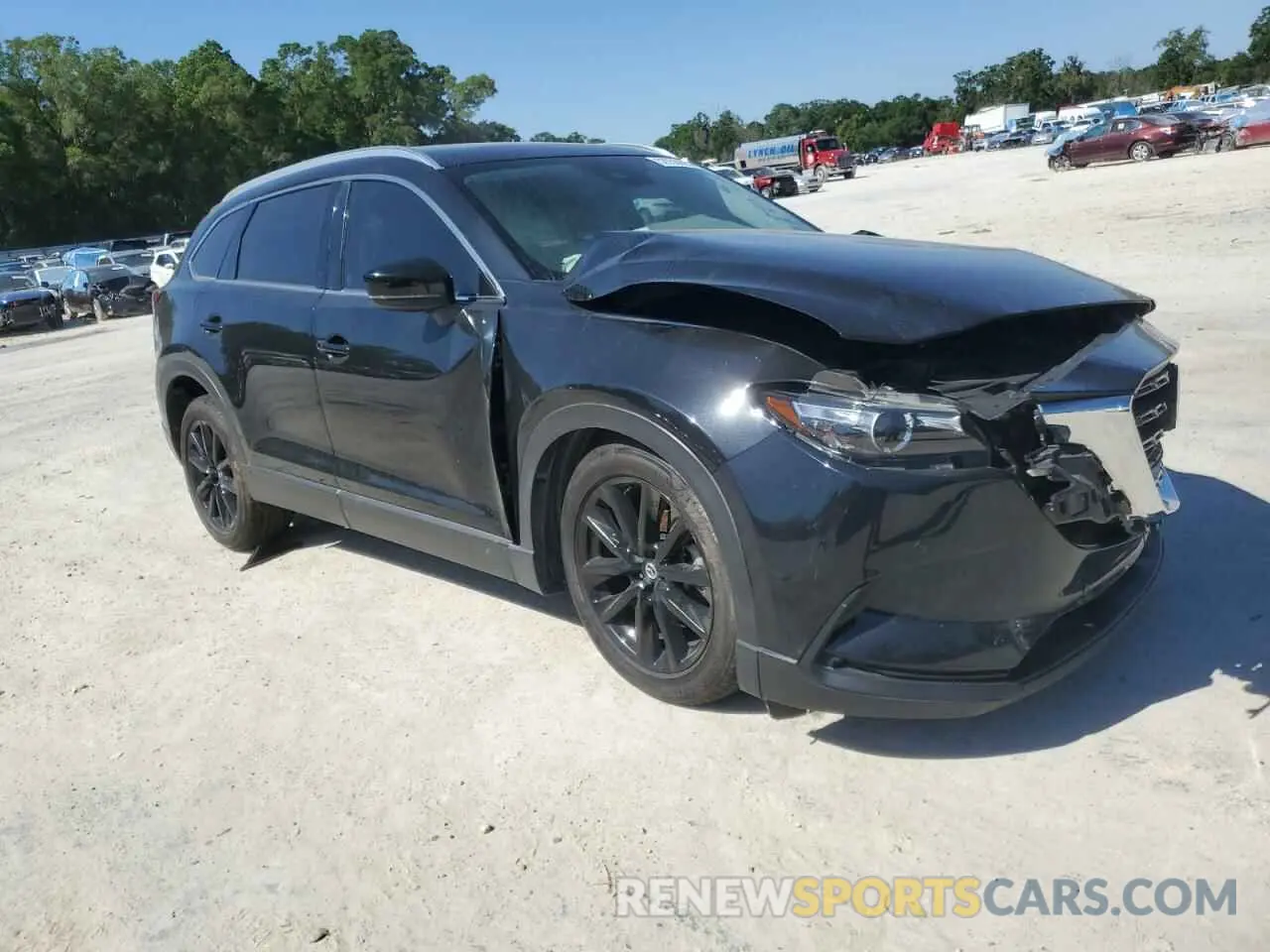 4 Photograph of a damaged car JM3TCBAY5N0604615 MAZDA CX-9 2022