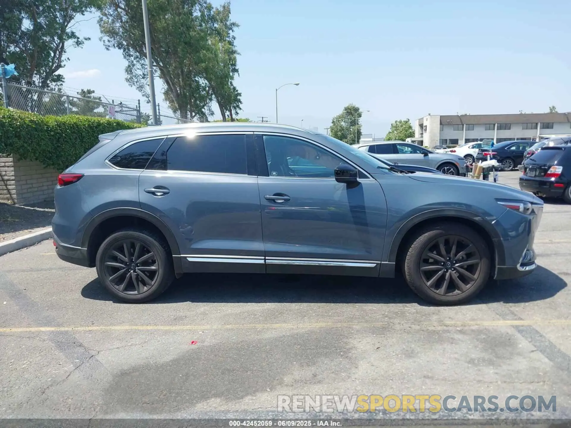 13 Фотография поврежденного автомобиля JM3TCBDY1N0611766 MAZDA CX-9 2022