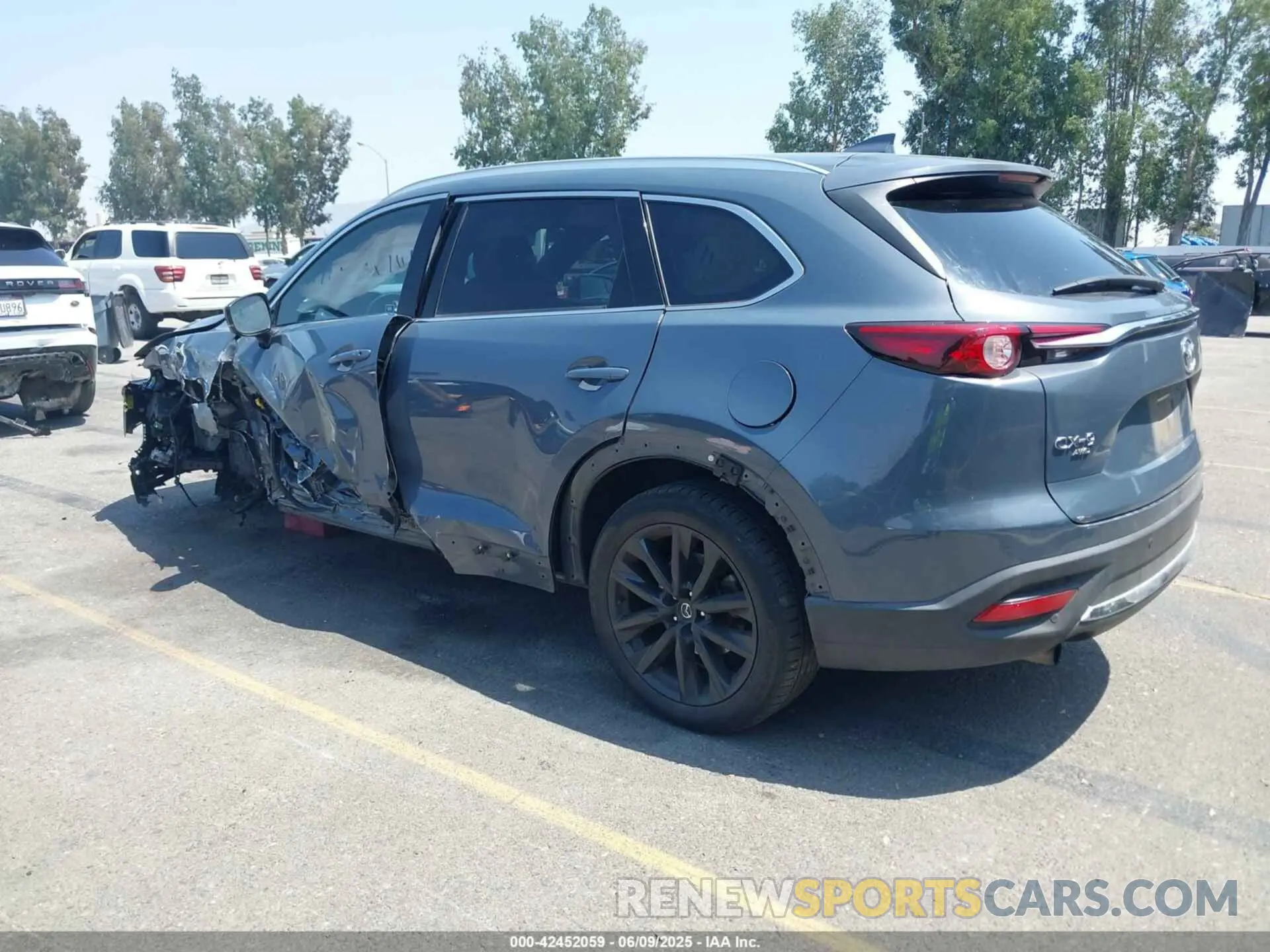 3 Фотография поврежденного автомобиля JM3TCBDY1N0611766 MAZDA CX-9 2022