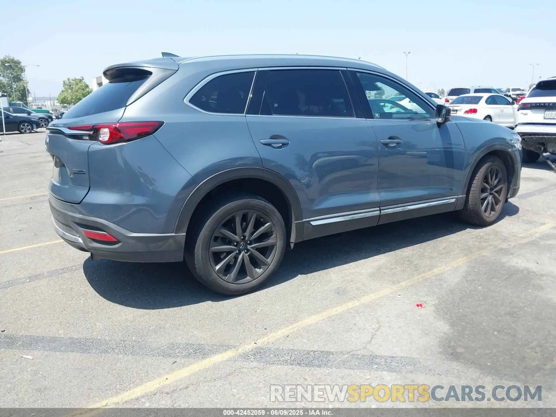 4 Фотография поврежденного автомобиля JM3TCBDY1N0611766 MAZDA CX-9 2022