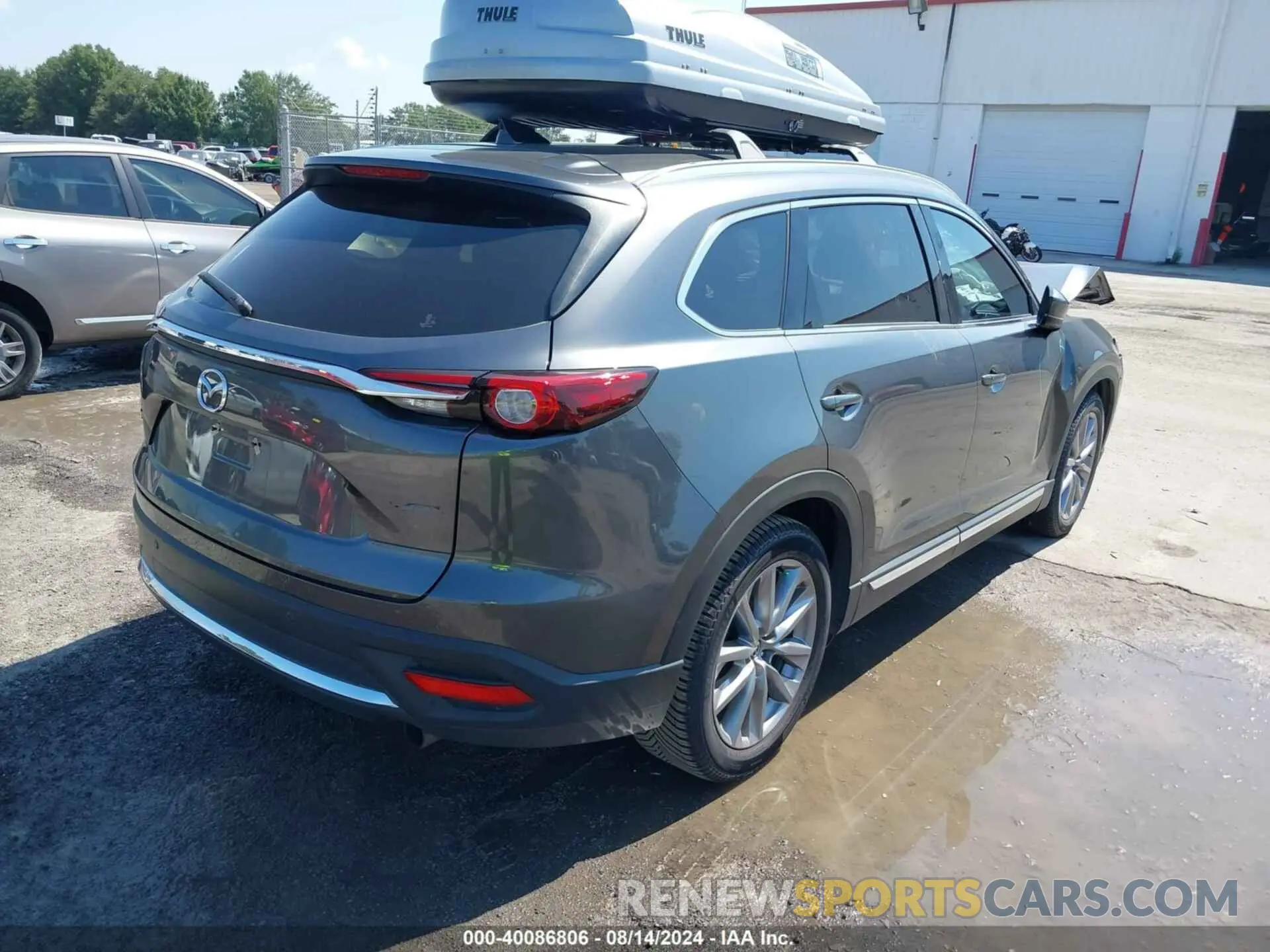 4 Photograph of a damaged car JM3TCBDY4N0618680 MAZDA CX-9 2022