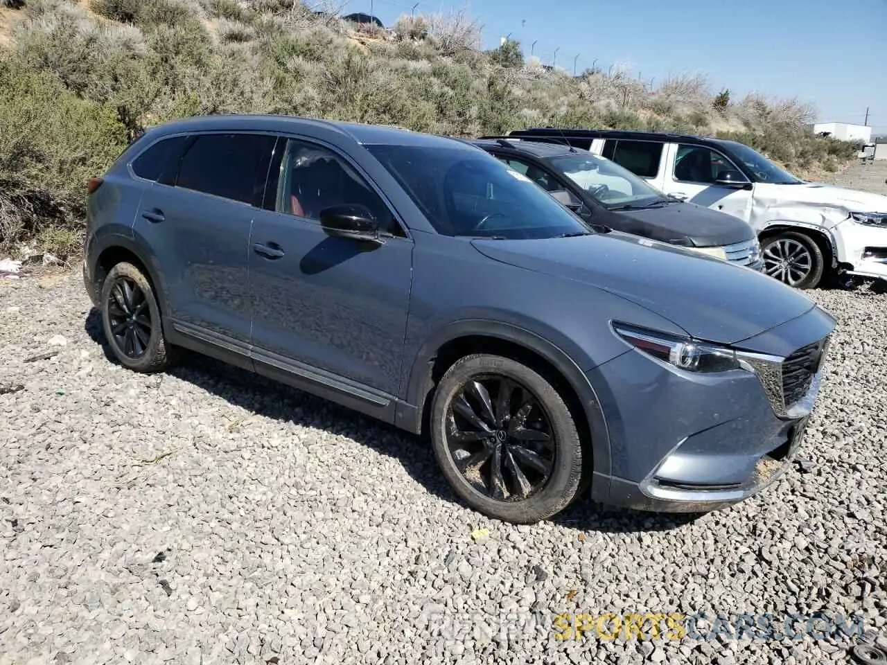 4 Фотография поврежденного автомобиля JM3TCBDY5N0628165 MAZDA CX-9 2022