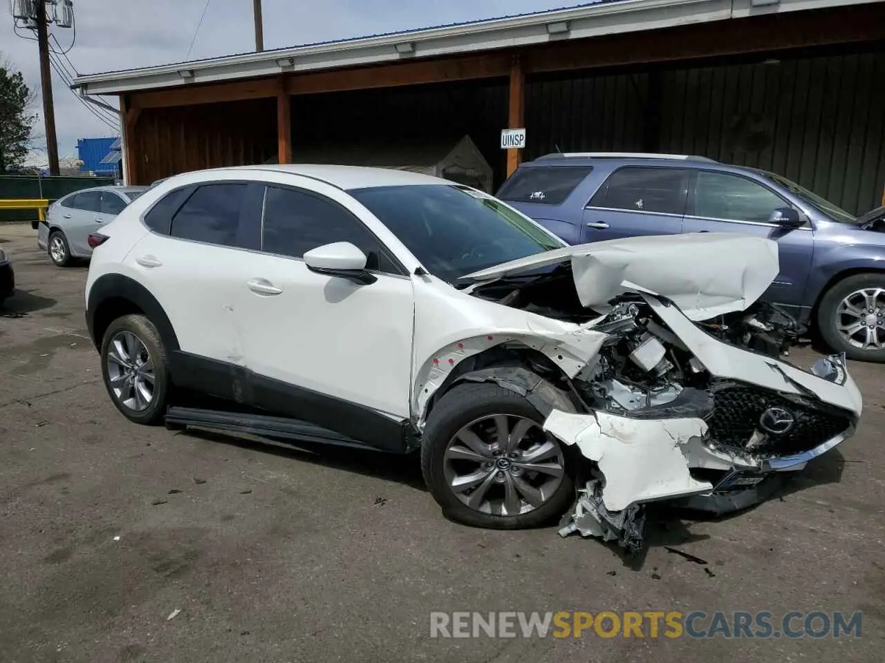 4 Photograph of a damaged car 3MVDMABL3MM239370 MAZDA CX30 2021