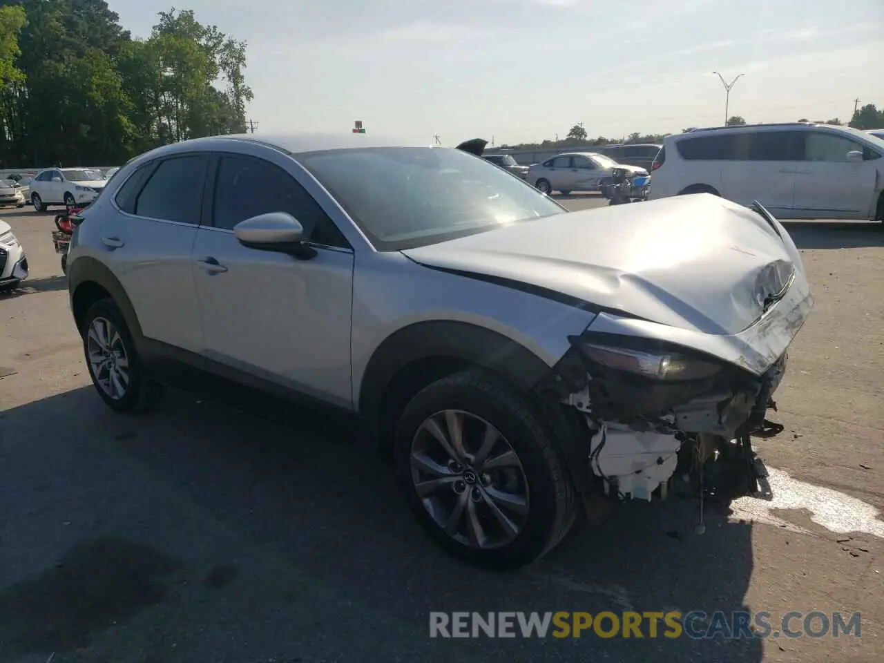 4 Photograph of a damaged car 3MVDMABL5MM308933 MAZDA CX30 2021