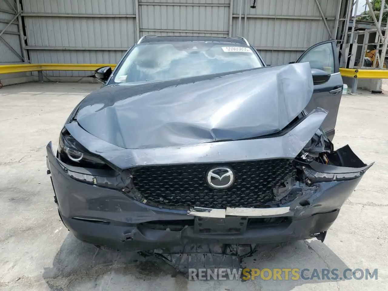 11 Photograph of a damaged car 3MVDMBAY0MM310561 MAZDA CX30 2021
