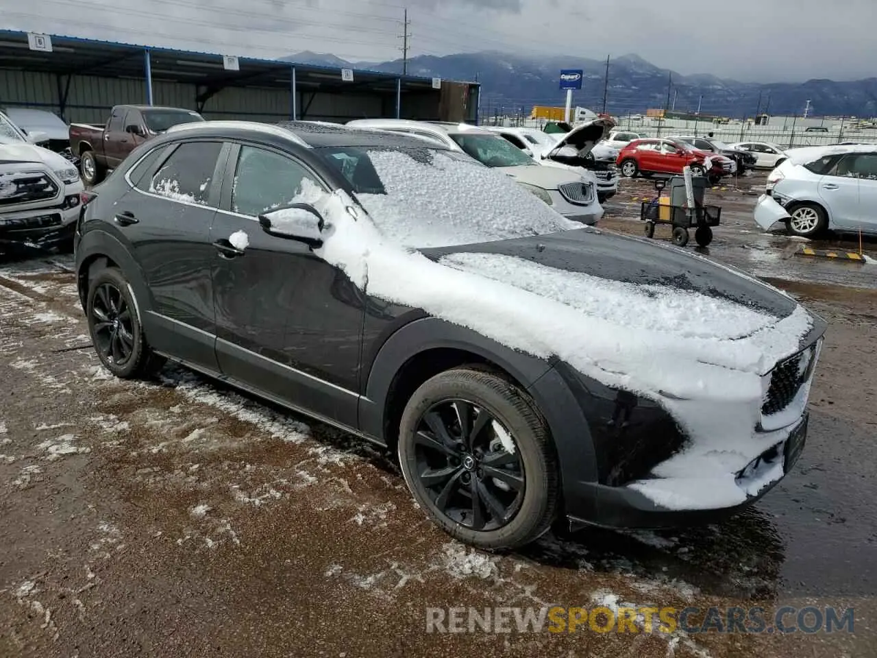 4 Photograph of a damaged car 3MVDMBAYXMM309787 MAZDA CX30 2021