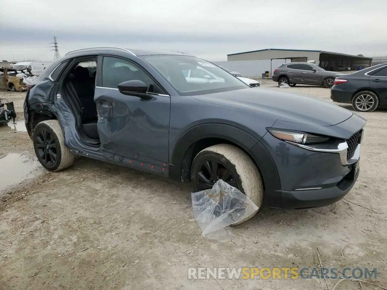 4 Фотография поврежденного автомобиля 3MVDMBAYXMM314228 MAZDA CX30 2021
