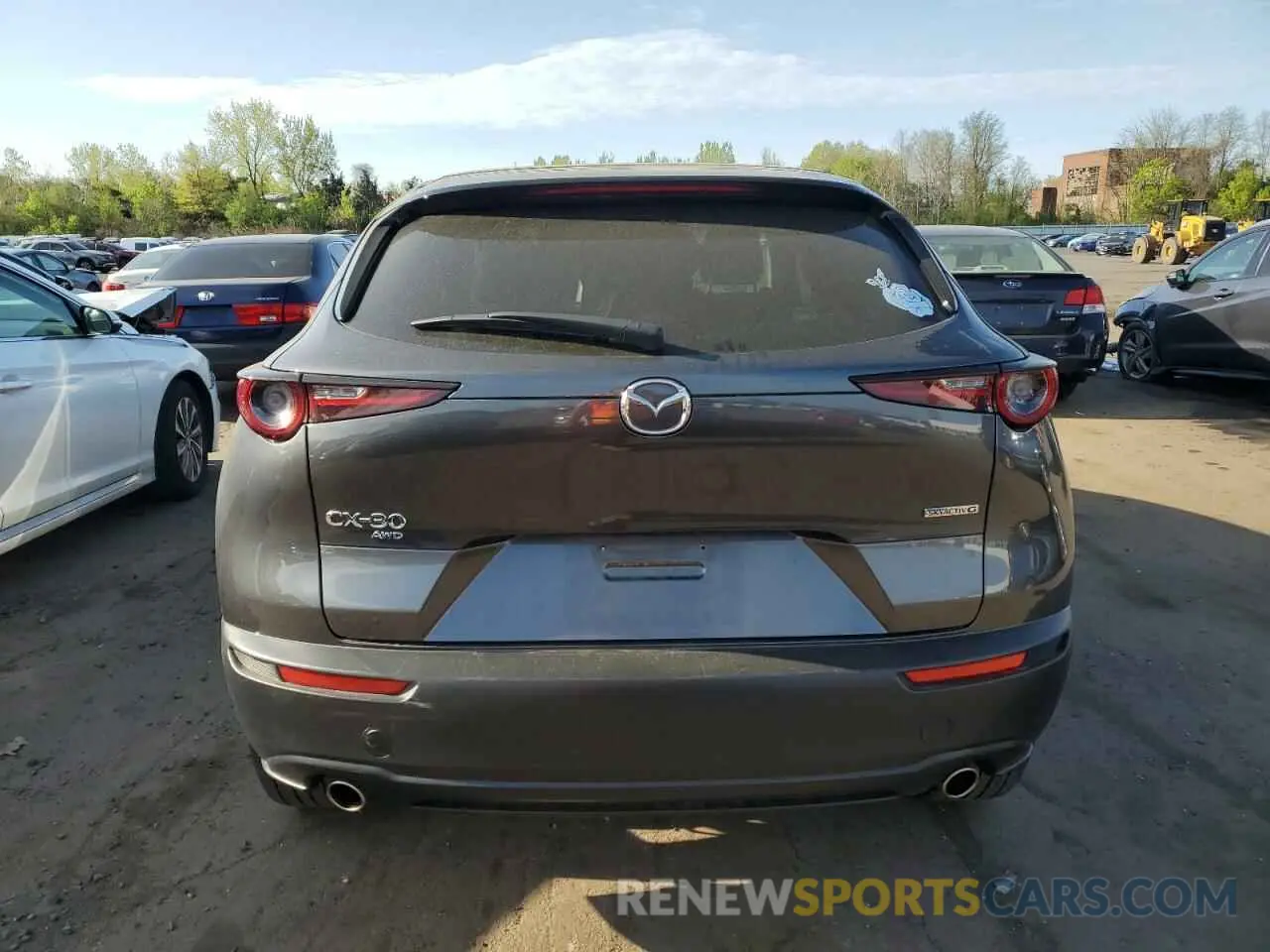 6 Фотография поврежденного автомобиля 3MVDMBCL4MM212408 MAZDA CX30 2021