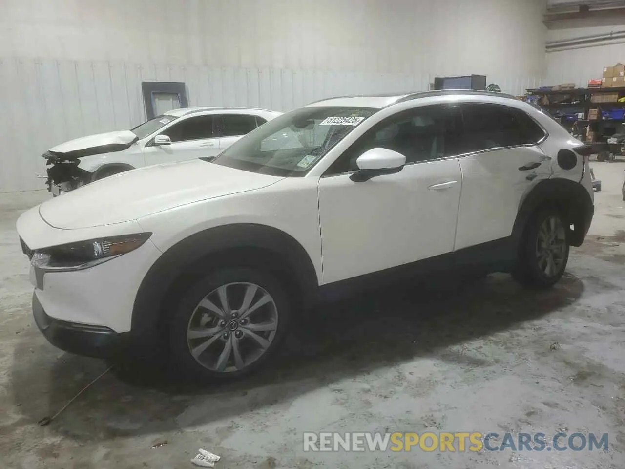1 Фотография поврежденного автомобиля 3MVDMBDL2MM305734 MAZDA CX30 2021
