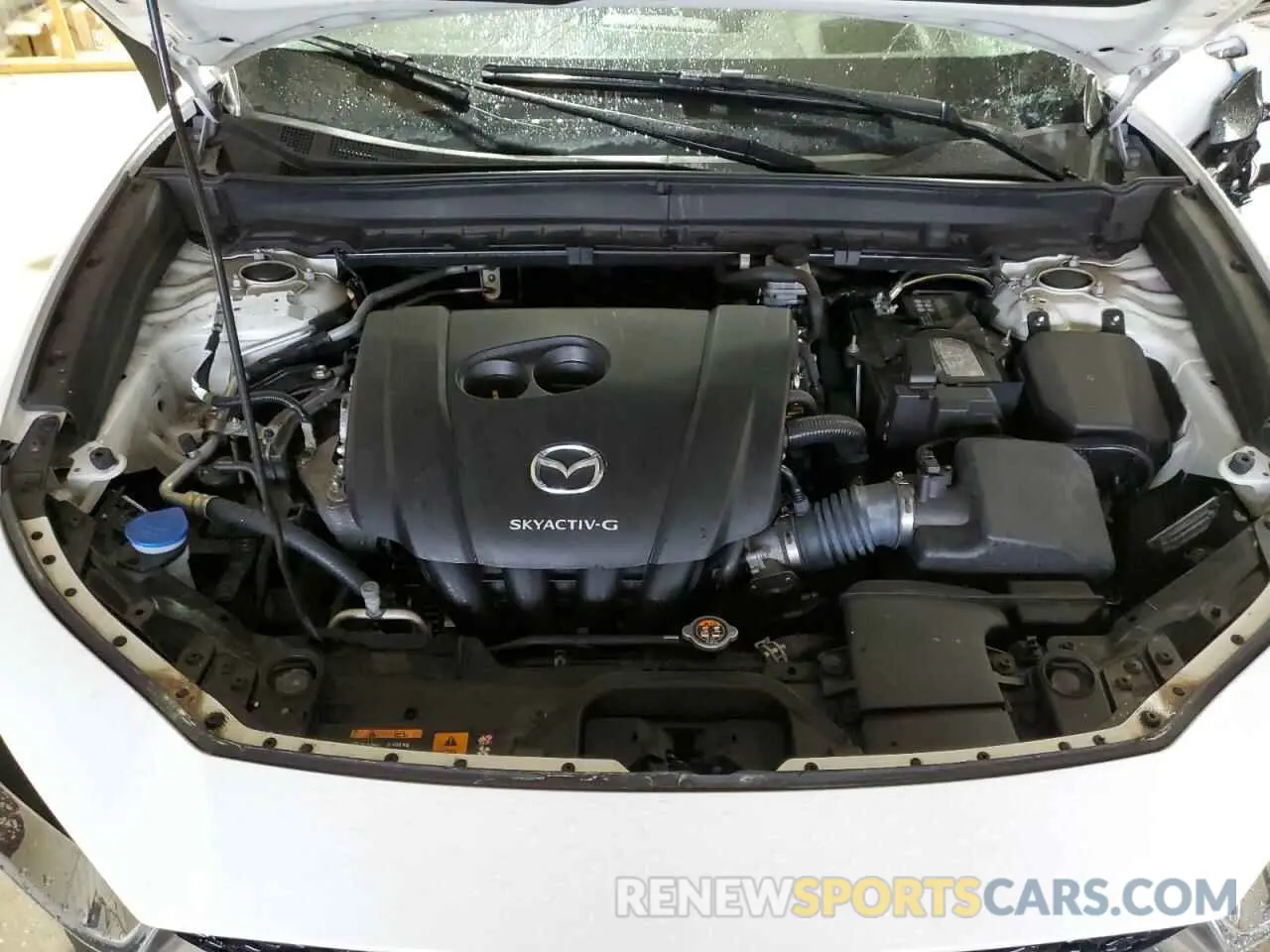 12 Фотография поврежденного автомобиля 3MVDMBDL7MM209257 MAZDA CX30 2021