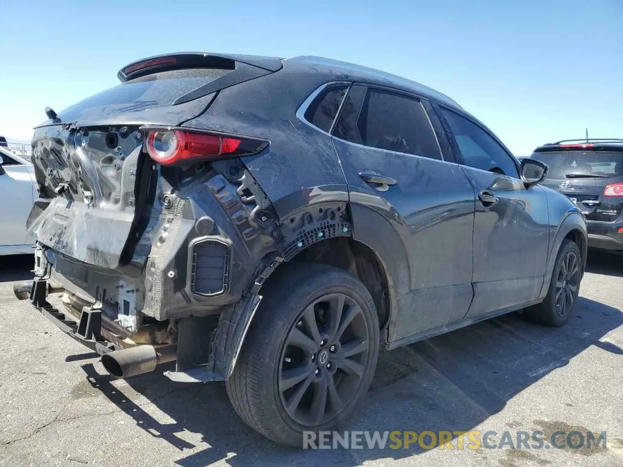 3 Фотография поврежденного автомобиля 3MVDMBDY0MM254973 MAZDA CX30 2021