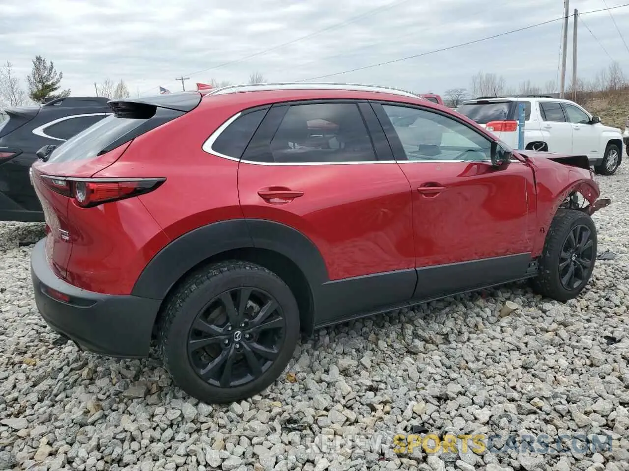 3 Фотография поврежденного автомобиля 3MVDMBDY8MM307404 MAZDA CX30 2021