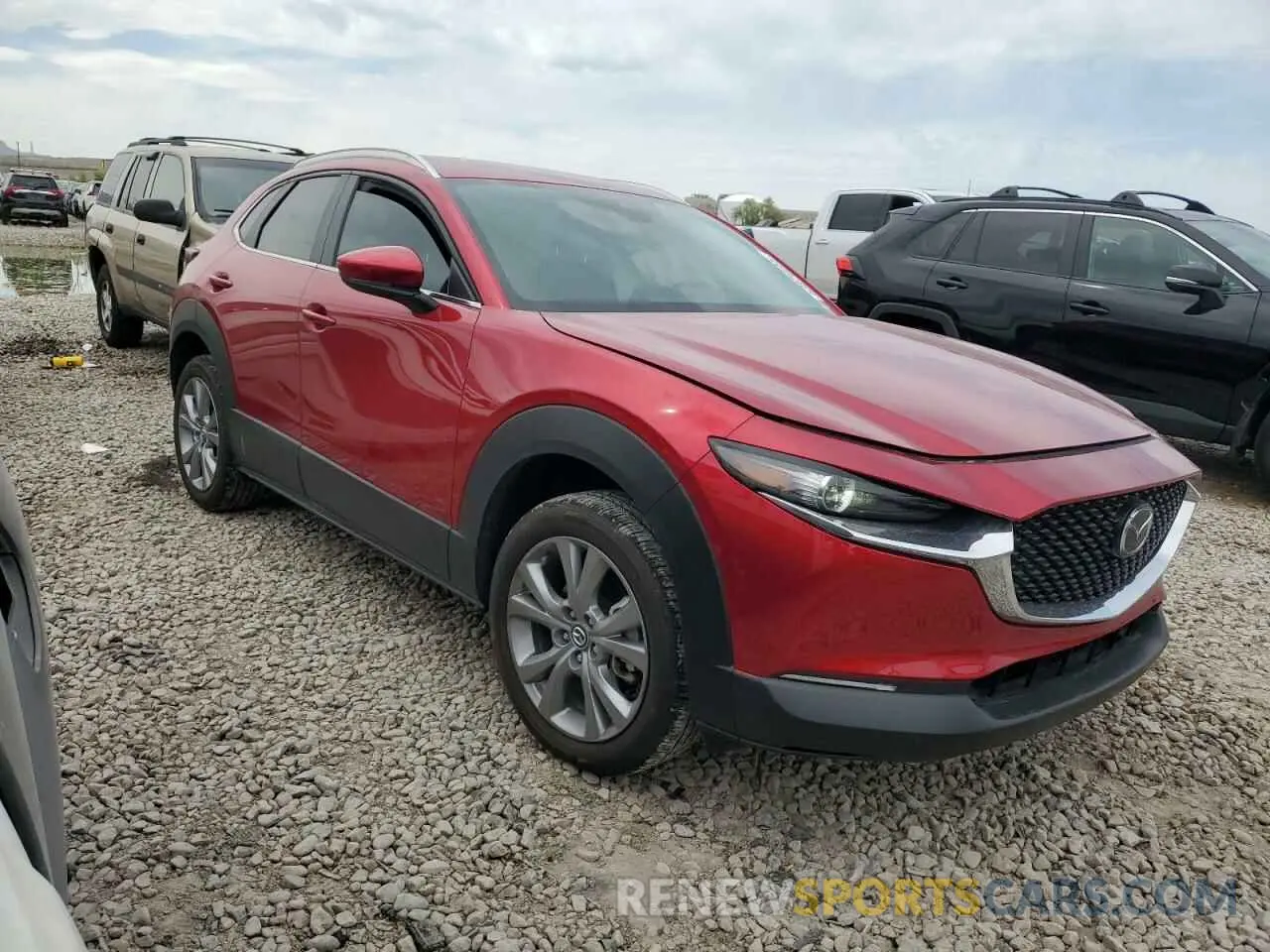 4 Фотография поврежденного автомобиля 3MVDMBBL0NM409577 MAZDA CX30 2022