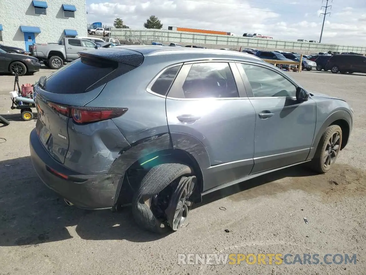 3 Photograph of a damaged car 3MVDMBCL2NM430056 MAZDA CX30 2022