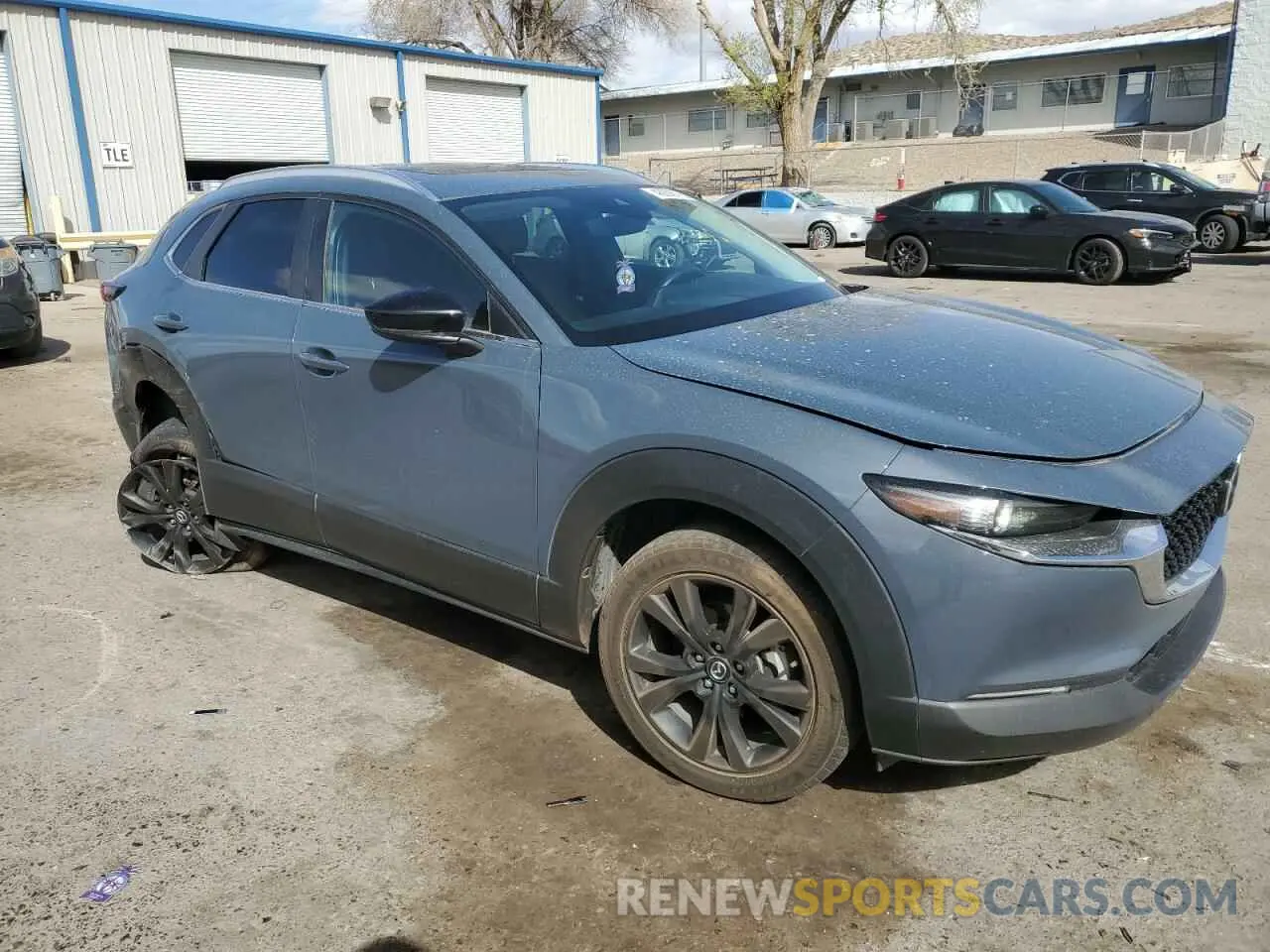 4 Photograph of a damaged car 3MVDMBCL2NM430056 MAZDA CX30 2022