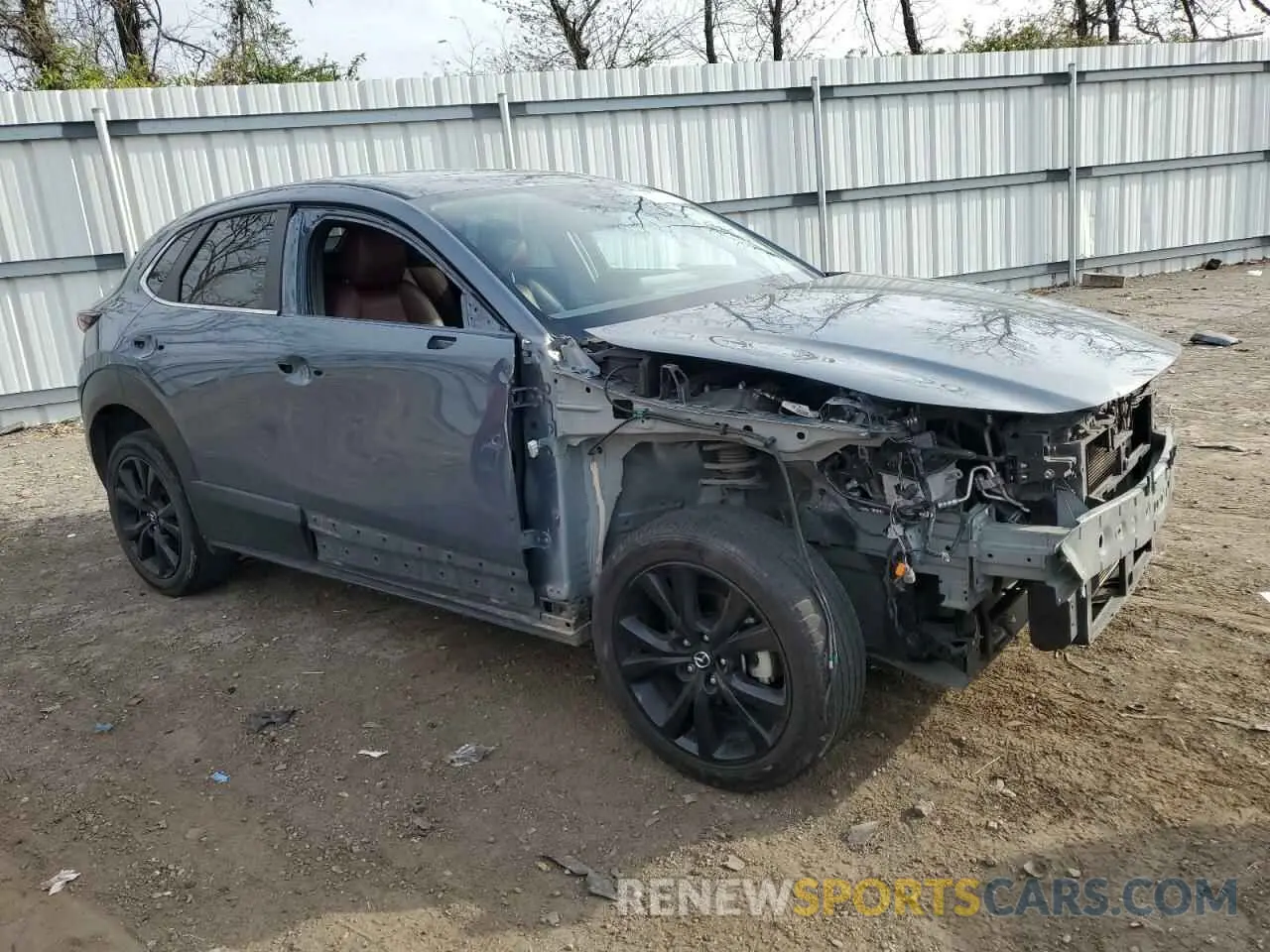 4 Photograph of a damaged car 3MVDMBCL7NM400941 MAZDA CX30 2022