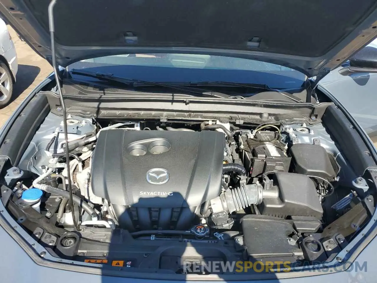 12 Фотография поврежденного автомобиля 3MVDMBCL7NM455308 MAZDA CX30 2022