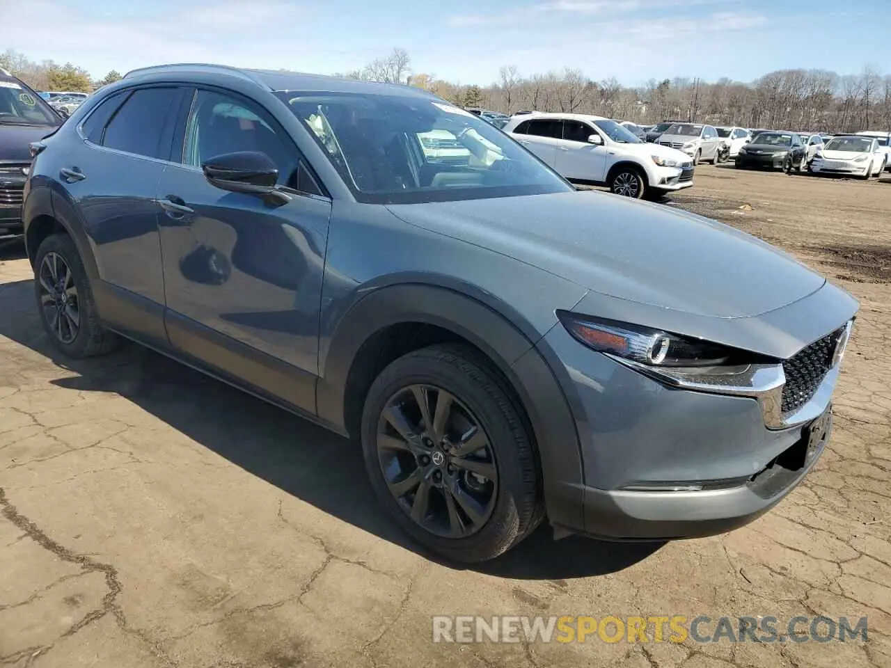 4 Фотография поврежденного автомобиля 3MVDMBCL7NM455308 MAZDA CX30 2022